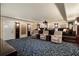 Luxurious media room with tiered seating and plush reclining chairs for an immersive entertainment experience at 790 Thornberry Dr, Alpharetta, GA 30022