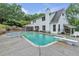 Backyard with an inground pool, jacuzzi, and diving board at 143 Navajo Trl, Rydal, GA 30171
