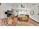 Airy bedroom featuring stylish decor and hardwood floors at 143 Navajo Trl, Rydal, GA 30171