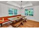 Dining area with rustic table, bench seating and natural light with views of the outdoors at 143 Navajo Trl, Rydal, GA 30171