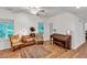 Living room featuring hardwood floors and antique furniture at 143 Navajo Trl, Rydal, GA 30171