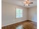 Cozy bedroom with hardwood floors, ample natural light, and ceiling fan at 1992 Cascade Sw Rd, Atlanta, GA 30311
