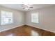 Bright bedroom with hardwood flooring, window, and neutral walls at 1992 Cascade Sw Rd, Atlanta, GA 30311