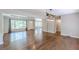 Spacious living room with hardwood floors, large windows and modern lighting at 1992 Cascade Sw Rd, Atlanta, GA 30311