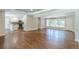 Open concept layout featuring hardwood floors and a view of the modern kitchen at 1992 Cascade Sw Rd, Atlanta, GA 30311