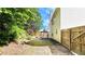 Backyard with green space, a wooden fence and a gazebo at 2203 Beacon Crest Dr, Buford, GA 30519
