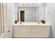 Fresh bathroom featuring double sinks, bright lighting, and a large mirror enhancing the airy feel at 2203 Beacon Crest Dr, Buford, GA 30519