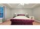 Spacious bedroom with hardwood floors and a view of the natural light at 2203 Beacon Crest Dr, Buford, GA 30519