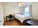 Bedroom featuring a bed, desk, chair, closet, and natural lighting at 2203 Beacon Crest Dr, Buford, GA 30519