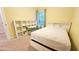 Bedroom with white shelving unit and bed at 2203 Beacon Crest Dr, Buford, GA 30519