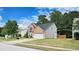 Two-story brick home with a well-manicured lawn at 2203 Beacon Crest Dr, Buford, GA 30519