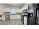 Modern kitchen with stainless steel appliances and granite countertops at 2203 Beacon Crest Dr, Buford, GA 30519