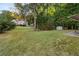 Large backyard featuring mature trees, and lush grass at 10 Bunker Lane St, Covington, GA 30014
