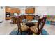 Bright kitchen with wood cabinets, stainless steel appliances, and breakfast bar at 10 Bunker Lane St, Covington, GA 30014