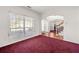 Living room with large windows and hardwood flooring at 10 Bunker Lane St, Covington, GA 30014