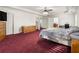 Spacious main bedroom featuring large windows, and ensuite bathroom at 10 Bunker Lane St, Covington, GA 30014