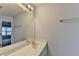 Bathroom with double sink vanity, large mirror and gray walls at 1635 Rushing River Way, Suwanee, GA 30024