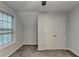 Bedroom with closet and window to the left at 1635 Rushing River Way, Suwanee, GA 30024