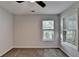 Bedroom with two windows looking out to the trees at 1635 Rushing River Way, Suwanee, GA 30024