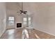 Bright living room featuring a fireplace and vaulted ceilings at 1635 Rushing River Way, Suwanee, GA 30024