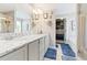 Luxurious bathroom with double vanities, granite countertops, a soaking tub, and a separate shower at 505 Alta Ct, Villa Rica, GA 30180