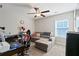 Comfortable bedroom with a ceiling fan, plush carpet, and neutral walls at 505 Alta Ct, Villa Rica, GA 30180