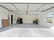Spacious garage featuring an epoxy floor, ample natural light, and plenty of room for storage at 505 Alta Ct, Villa Rica, GA 30180