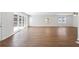 Bright living room showcasing hardwood floors, large windows and a porch at 1345 Sw Dodson Dr, Atlanta, GA 30311