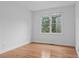 Bright bedroom with natural light and gleaming hardwood floors at 1692 Holcomb Lake Rd, Marietta, GA 30062