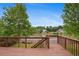 Wide deck overlooking the pond and green spaces makes for a relaxing and private space at 1692 Holcomb Lake Rd, Marietta, GA 30062