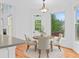 Bright dining area with a round table, four chairs, and natural light at 1692 Holcomb Lake Rd, Marietta, GA 30062