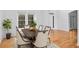 Bright dining room with a modern table, stylish chairs, and natural light at 1692 Holcomb Lake Rd, Marietta, GA 30062