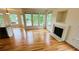 Beautiful living area with a fireplace and pond views at 1692 Holcomb Lake Rd, Marietta, GA 30062