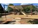 Community playground equipment including swings, slides, and climbing equipment available for neighborhood children at 1692 Holcomb Lake Rd, Marietta, GA 30062