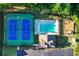 Aerial view of community amenities, including tennis courts, pool, playground, parking, and clubhouse at 2978 Legislative Ln, Buford, GA 30519