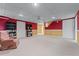 Finished basement featuring neutral carpet, accent walls, and recessed lighting at 2978 Legislative Ln, Buford, GA 30519
