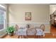Cozy dining room featuring a charming table setting and an abundance of natural light at 2978 Legislative Ln, Buford, GA 30519