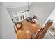 Elegant living room with hardwood floors, fireplace and French doors to the outside at 2978 Legislative Ln, Buford, GA 30519