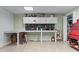 Basement workshop with pegboard wall and countertop work space at 2978 Legislative Ln, Buford, GA 30519