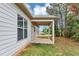 Backyard featuring a covered patio with lots of green space at 6755 Biscayne Blvd, Rex, GA 30273