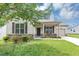 Charming single-story home with neutral siding, stone accents, and a well-maintained lawn at 6755 Biscayne Blvd, Rex, GA 30273