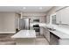 Bright kitchen featuring stainless steel appliances, granite countertops, and an island at 6755 Biscayne Blvd, Rex, GA 30273