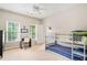 Spacious bedroom features a bunk bed, desk and natural light creating a comfortable and versatile space at 940 Kinghorn Nw Dr, Kennesaw, GA 30152
