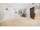 Spacious bonus room boasts a sliding barn door, dining table, and a fun basketball hoop for active recreation at 940 Kinghorn Nw Dr, Kennesaw, GA 30152