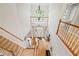 Elegant foyer with high ceilings, chandelier, staircase, and hardwood floors at 940 Kinghorn Nw Dr, Kennesaw, GA 30152