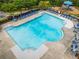 Expansive community pool with ample seating, providing a perfect spot for recreation and leisure at 940 Kinghorn Nw Dr, Kennesaw, GA 30152
