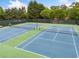 Well-maintained tennis courts with professional surfacing, providing a great recreational amenity at 940 Kinghorn Nw Dr, Kennesaw, GA 30152