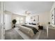 Modern bedroom with a ceiling fan, neutral walls, and soft gray carpet, creating a calm and inviting atmosphere at 238 Chads Ford Way, Roswell, GA 30076