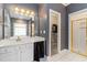 Bathroom with double sinks, shower, and a view of the soaking tub, offering a spa-like experience at 2651 Briarlake Ne Rd, Atlanta, GA 30345