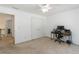 Bedroom with neutral carpet, closet, and a ceiling fan at 2651 Briarlake Ne Rd, Atlanta, GA 30345